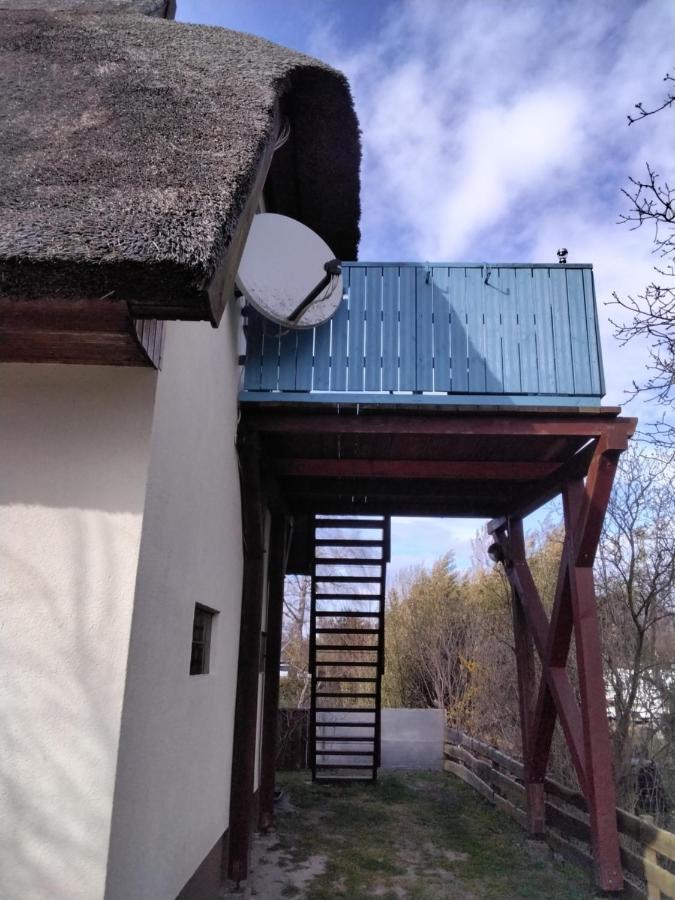 Im Rohrdachhaus *